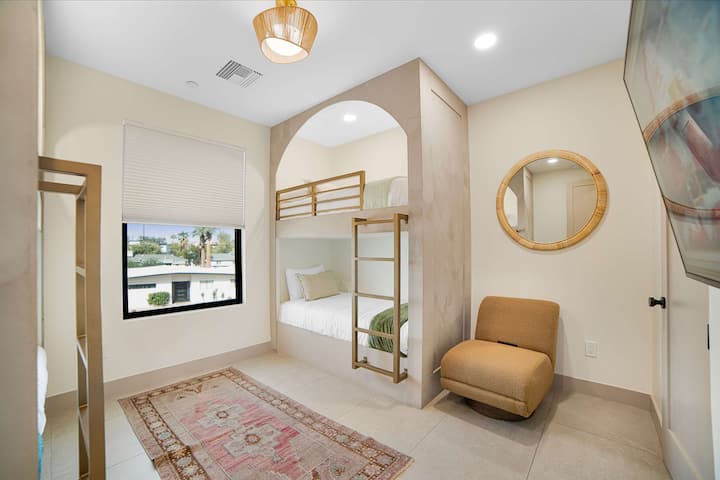 Perfect for kids or friends, this bunk room makes sharing both fun and comfortable.