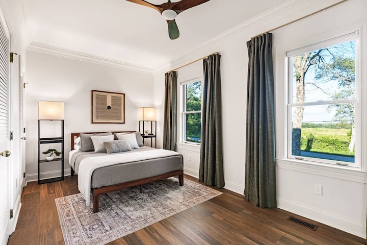 The Meadow Room- Morning light spills over the mountains and across the meadow in The Meadow Room, your private sanctuary with sweeping meadow views, ensuite bath and a 55-inch Roku TV.