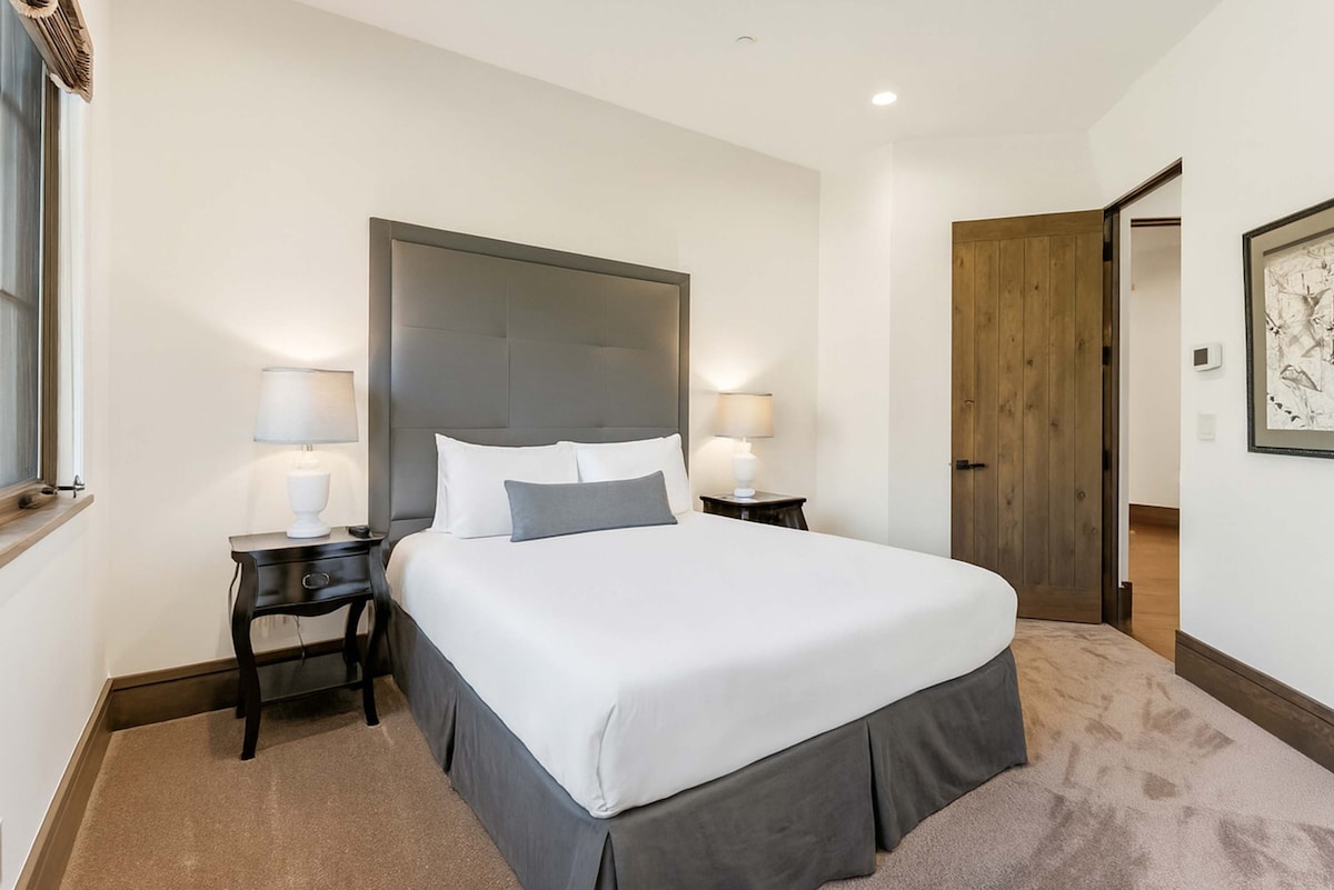 Bedroom 4: Queen bed, lower floor, closet, shared full bathroom