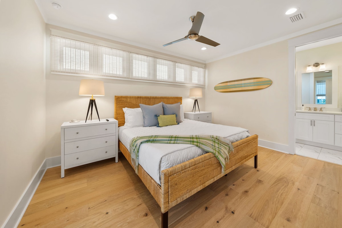 Bedroom #5 features king bed, with ensuite & smart tv.