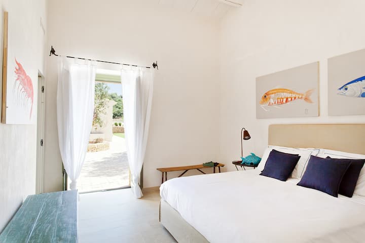 The first double bedroom on the ground floor of the main house (bedroom 1). 