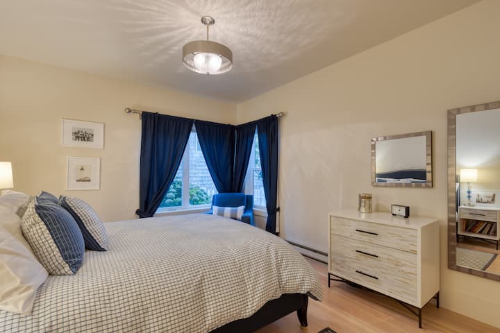 Bedroom 2 features a queen bed.