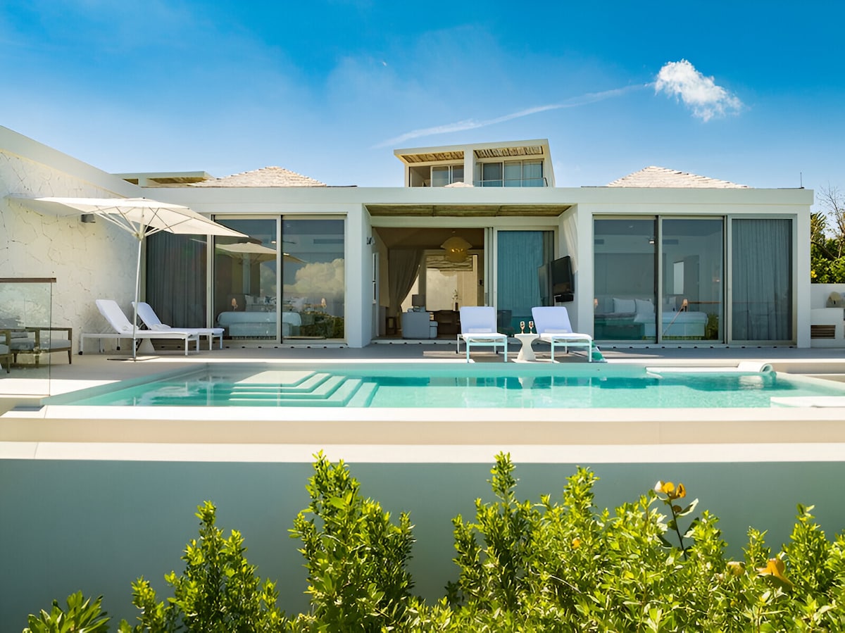 Serenity Awaits in a Modern Villa Steps from Beach