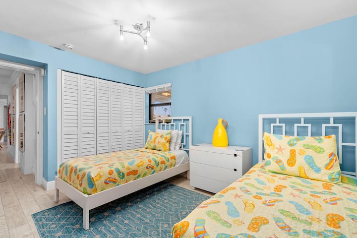 Fun and bright twin room with plenty of space for kids or friends to unwind.
