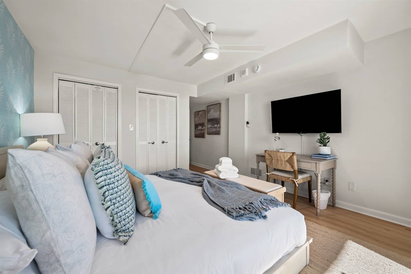 Recharge in comfort with a plush king bed, your favorite shows on a flat-screen TV, and a quiet workspace for when duty calls.