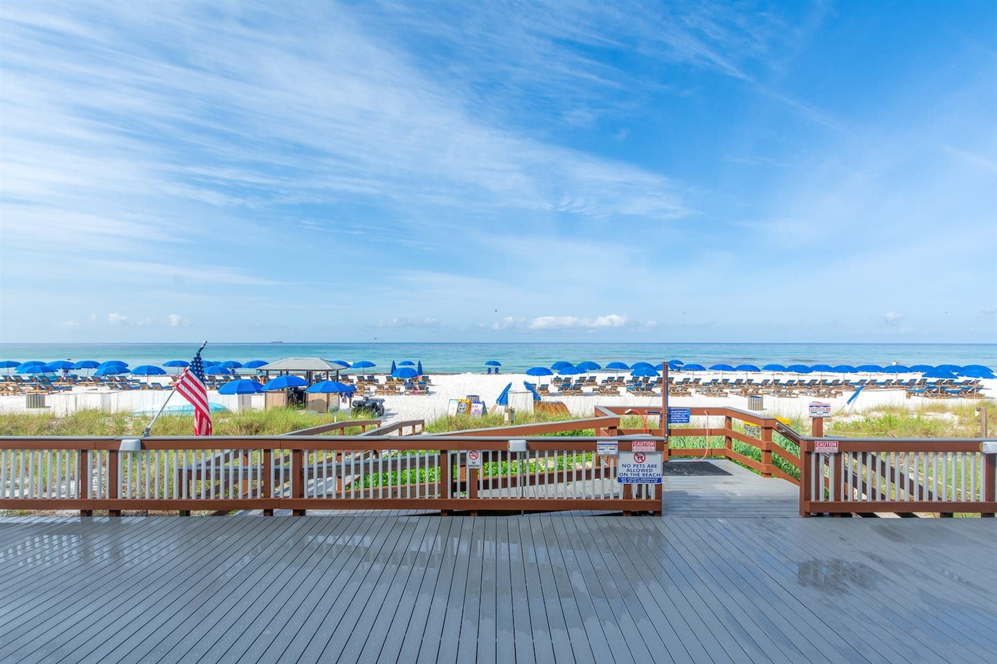 Aerial view of the beach and boardwalk in front of the building