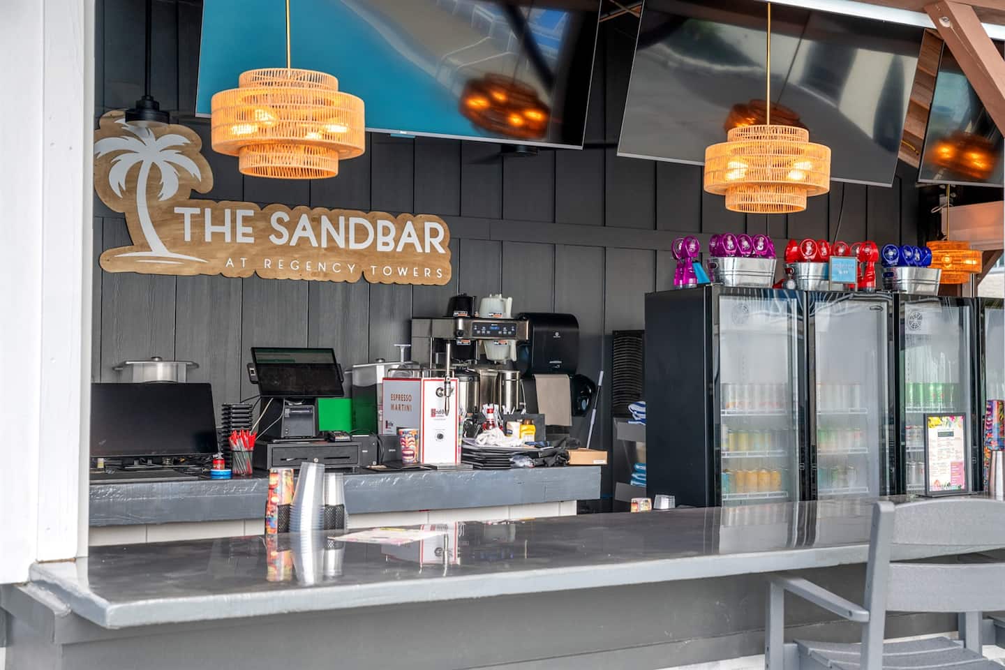 The Sandbar, the building's on-site bar and restaurant at Regency Towers