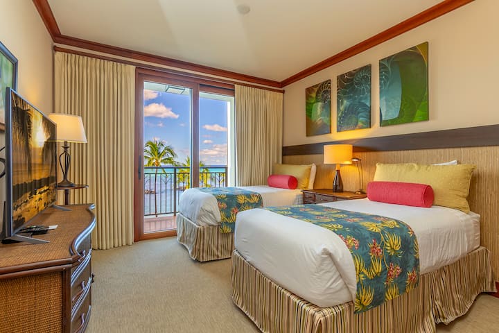 Две единични легла/директен достъп до веранда. 