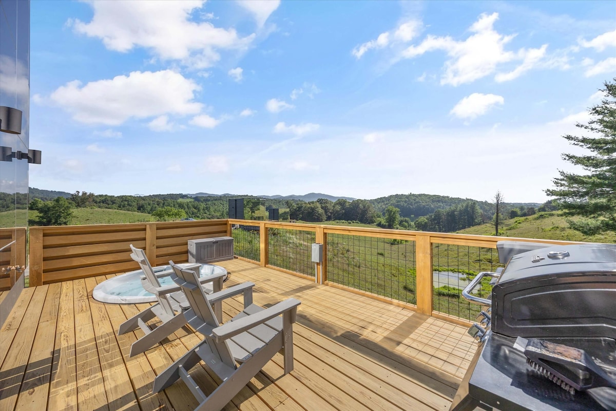 Deck with private hot tub and mountain views