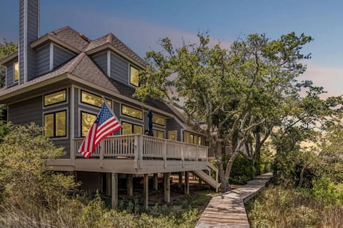 Popular Airbnb listing: Marshfront Sunrise Views • Dock• 2 Carts• Kayaks in Bald Head Island