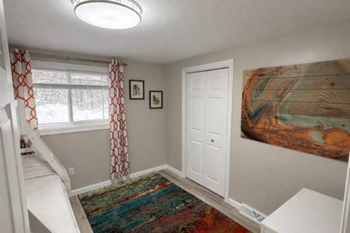 Comfortable bunk bedroom ideal for families, kids, or additional guests.