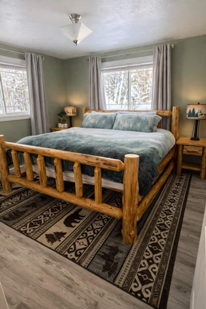 Rustic log bed brings authentic Upper Peninsula character and comfort.