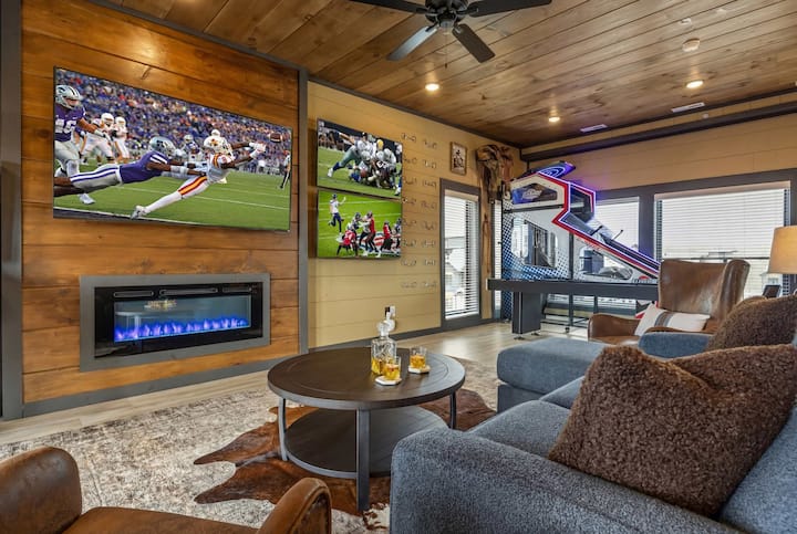 Relax on the sleeper sofa beside the fireplace after a fun-filled day