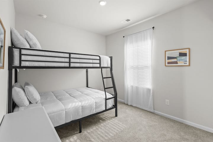 Configuración de litera completa sobre queen para dormir de forma flexible