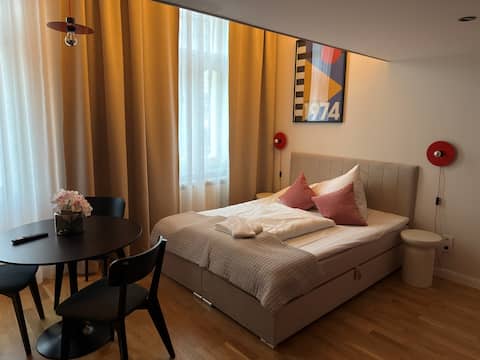 Heritage Haven – Mezzanine Apartment with Balcony