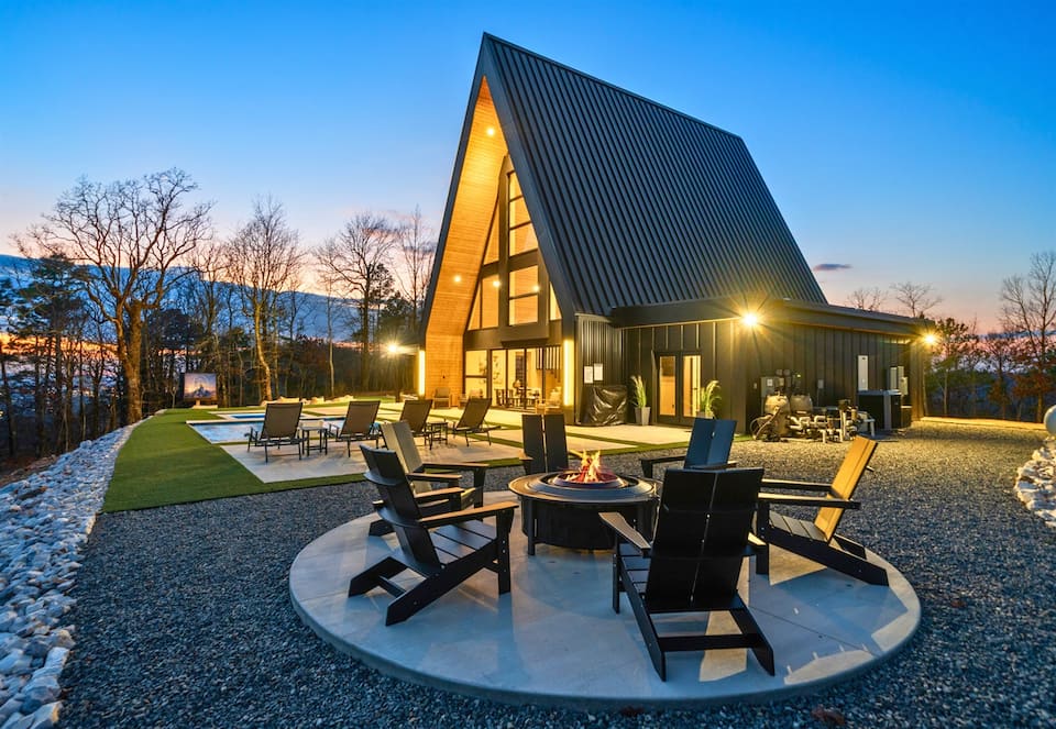 A glass-fronted A-frame on a mountain ridge, Hot Springs, Arkansas, United States, photo 1 of 10