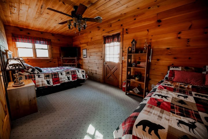 A spacious master bedroom features a queen bed and a full-size bed, with super comfy mattresses and bedding designed for restful sleep. This cozy retreat is the perfect place to recharge--or step out on the balcony for wondrous views. ️️