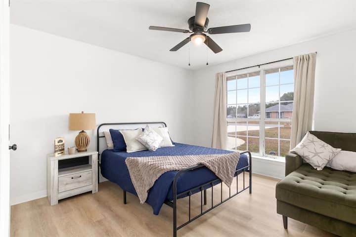 Queen Bedroom with Extra Seating | Pool Views & Natural Light | Quiet & Private