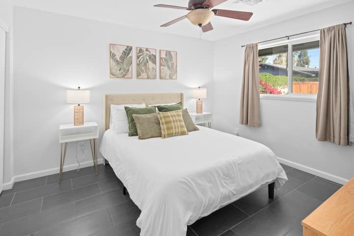 Bedroom 3- Queen bed, 6-drawer dresser, 55" Smart TV, Full-length mirror, closet, luggage rack