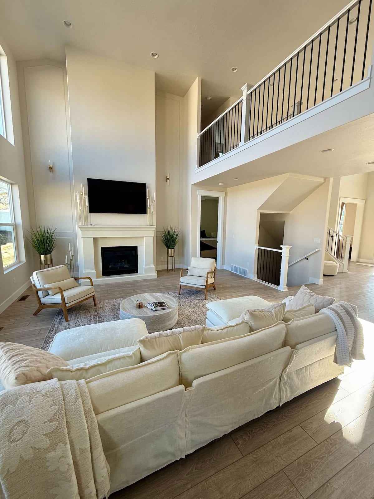 Living room with sectional and TV