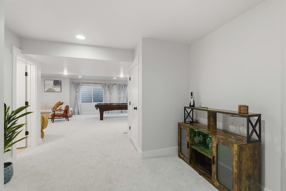 Downstairs game room with pool table