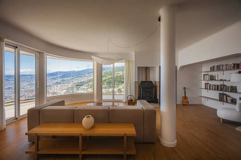 Top performing Airbnb: Sky Loft: 180° Ocean View Balcony + Fireplace in São Gonçalo