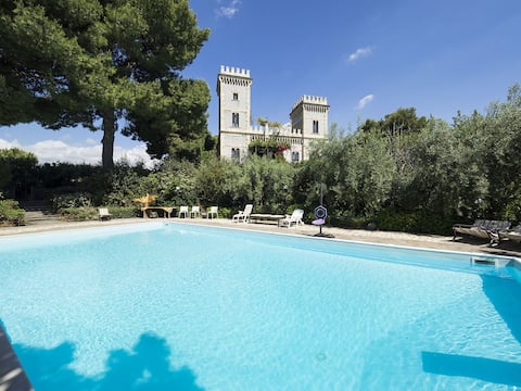 Castle near the sea with pool, park and views
