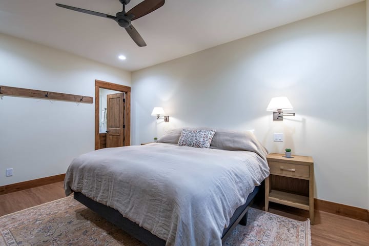 Third king bedroom with a dresser and en-suite access.