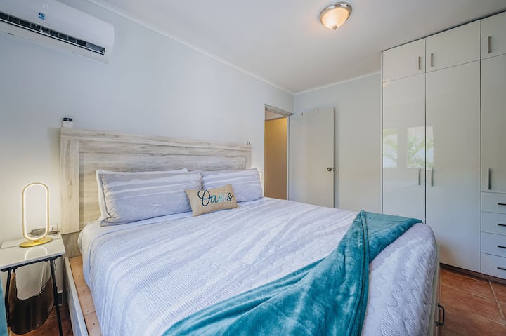 Bedroom 1 with a plush king-sized bed for ultimate comfort.