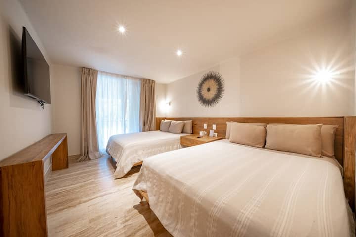 Dormitorio con dos camas.