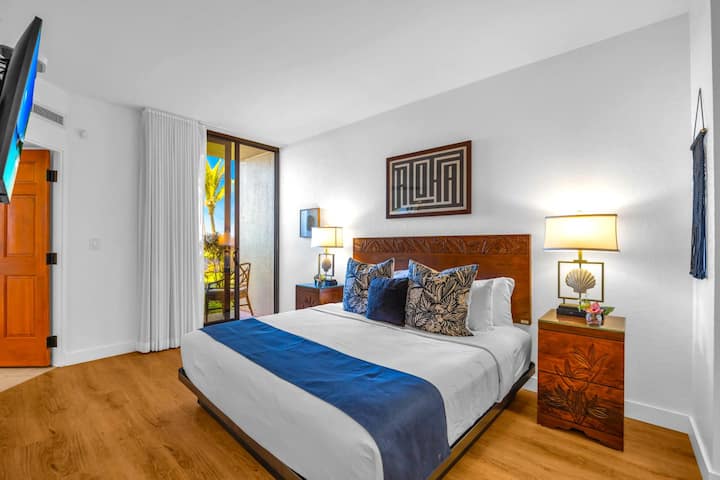 KS-104 Wake up refreshed in the stunning primary bedroom, where comfort meets breathtaking tropical surroundings