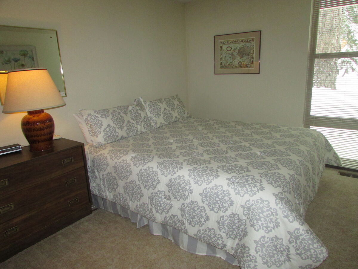 second bedroom with king bed