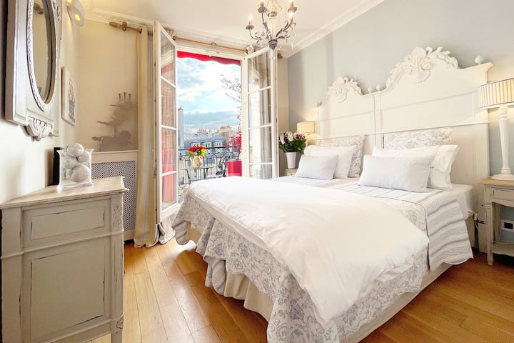 Beautiful bedroom 2 has a little balcony.