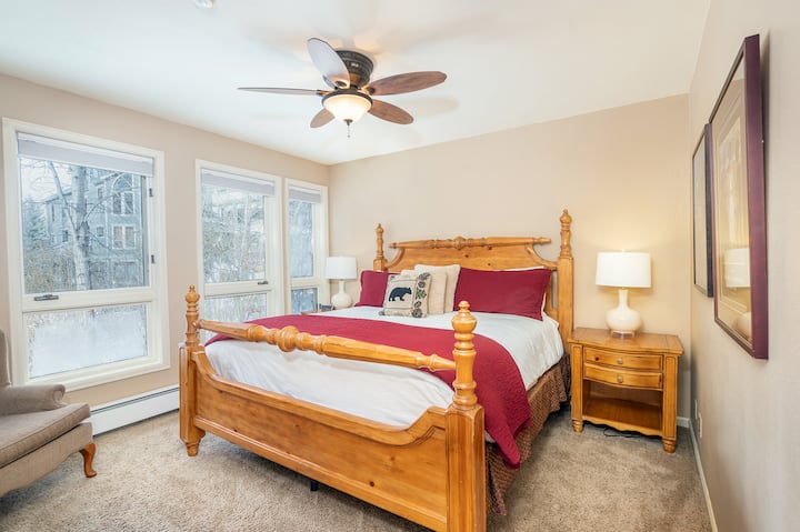 The master bedroom features a comfortable King Bed and mountain views.