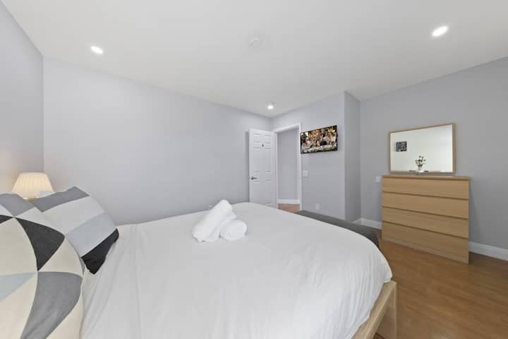 Bedroom 2 King Bed with a sleeper sofa and 42 Inch Smart TV