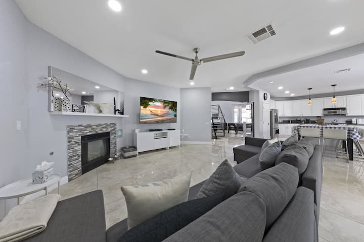 Watch your favorite shows on our HD LG 75 Inch TV with Samsung Sound Bar (Both sofas open up to a full size sofa bed)