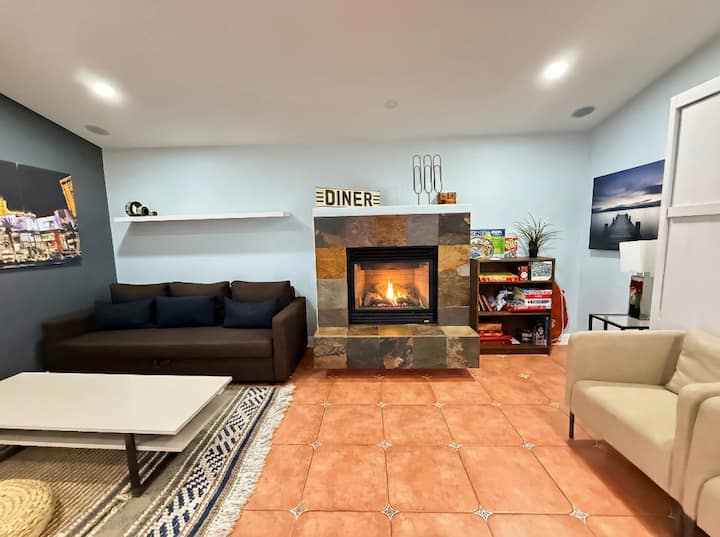 Upstairs Living Room Cozy up to the fireplace, or watch your favorite shows on the HD Smart TV, lots of board games to choose from. ( Sleeper sofa and murphy bed )