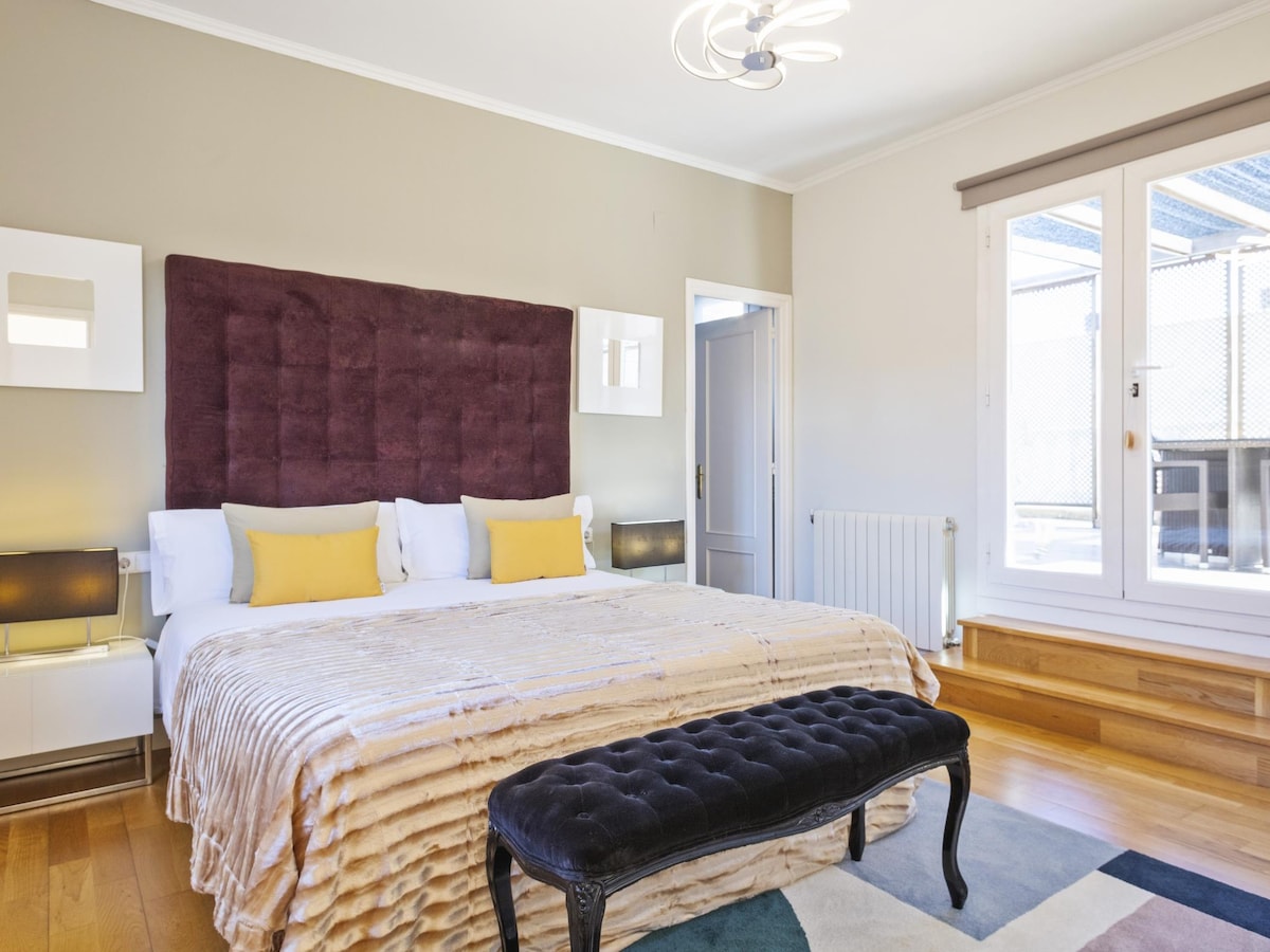 Bedroom 7: Located on the Upper Floor, this room features a wardrobe with safe, TV, and an en-suite bathroom. Two beds can be arranged as a double or singles upon request. Guests also enjoy access to the upper floor terrace for relaxation.