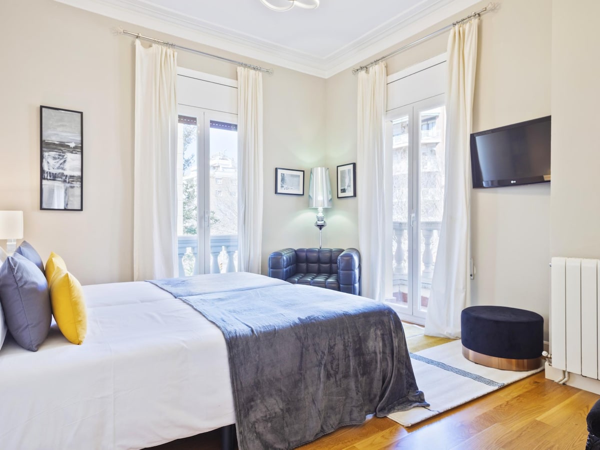 Bedroom 6: Located on the Main Floor, this bright room features large windows, one with balcony access. It includes a wardrobe with safe, TV, and two beds that can be arranged as a double bed or as two singles upon request.