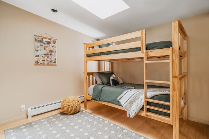The second bedroom on the second floor (next to the master): kids’ camping themed hideaway! Complete with organic linens and Crate and Kids’ furnishings.