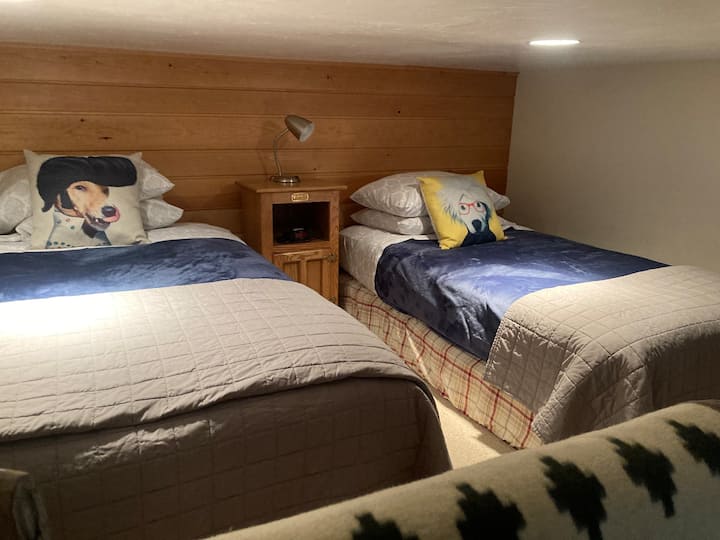 This is the additional sleeping, which is a 4 foot high loft with a steep ladder, not suitable for children under six or elderly.