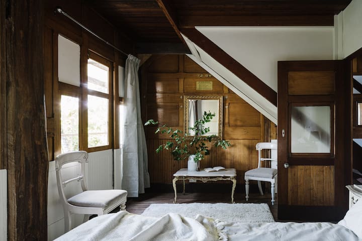The original owner had craned in a train carriage to use as a workshop during the build. Parts of that same carriage are now home to the interior of Otways Loft. You can spot carriage doors, walls, windows incorporated in the design everywhere.