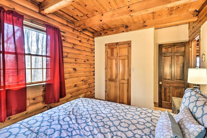 The wood wall feature adds a rustic and charming touch to the room!