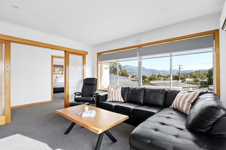 Large lounge room with plenty of seating for everyone.