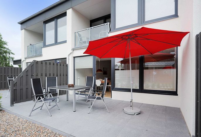 Leistungsstarkes Airbnb: Ferienwohnung Wattwurm, Haus Kunterbunt in Esens