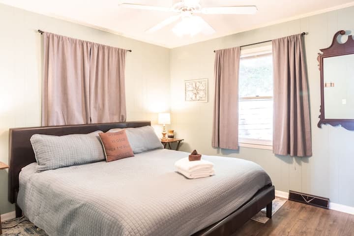 Main level king room with black-out curtains. Bathrobe is available. 