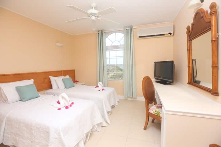 ห้องนอนที่ 3 พร้อมเตียงแฝดที่สามารถเปลี่ยนเป็นเตียงคิงไซส์