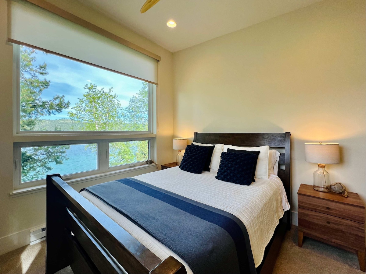 Dormitorio 3 con cama tamaño queen y vistas al lago