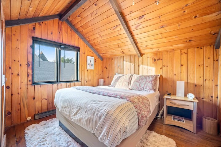 Super cozy bedrooms with queen beds, surrounded by knotty pine and high ceilings with a fan, you definitely feel like you have arrived up north! All 3 closet bedrooms include extra linens & blankets, fan, velvet hangers, dresser and noise machine.