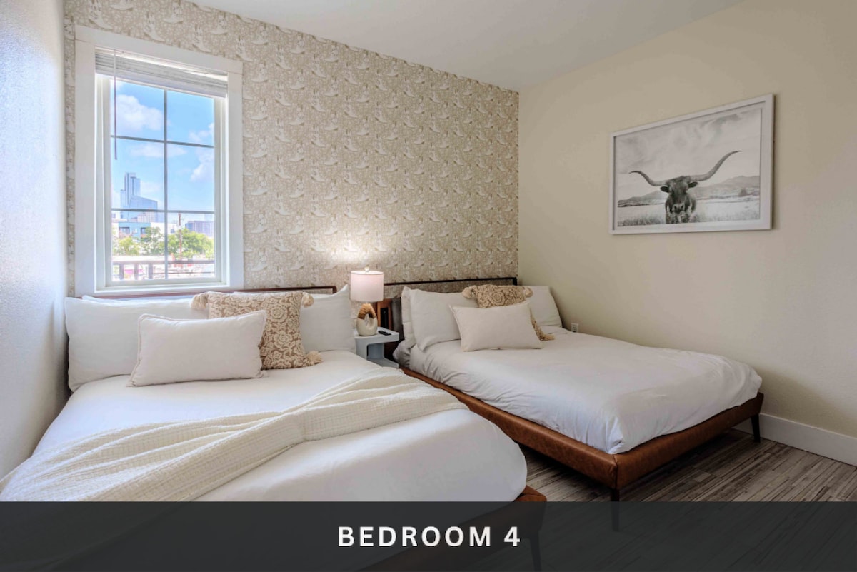 4号卧室配备两张全尺寸床，配备酒店品质的床上用品和智能电视